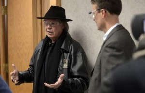 Neil Young takes a tour of the Poet laboratory with company founder, Jeff Broin Friday afternoon on a stop of his cross country road trip to promote ethanol and sustainable fuels in a converted 1959 Lincoln Continental, April 12, 2013. / Elisha Page / Argus Leader