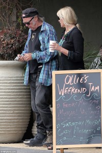 Neil young with foot brace